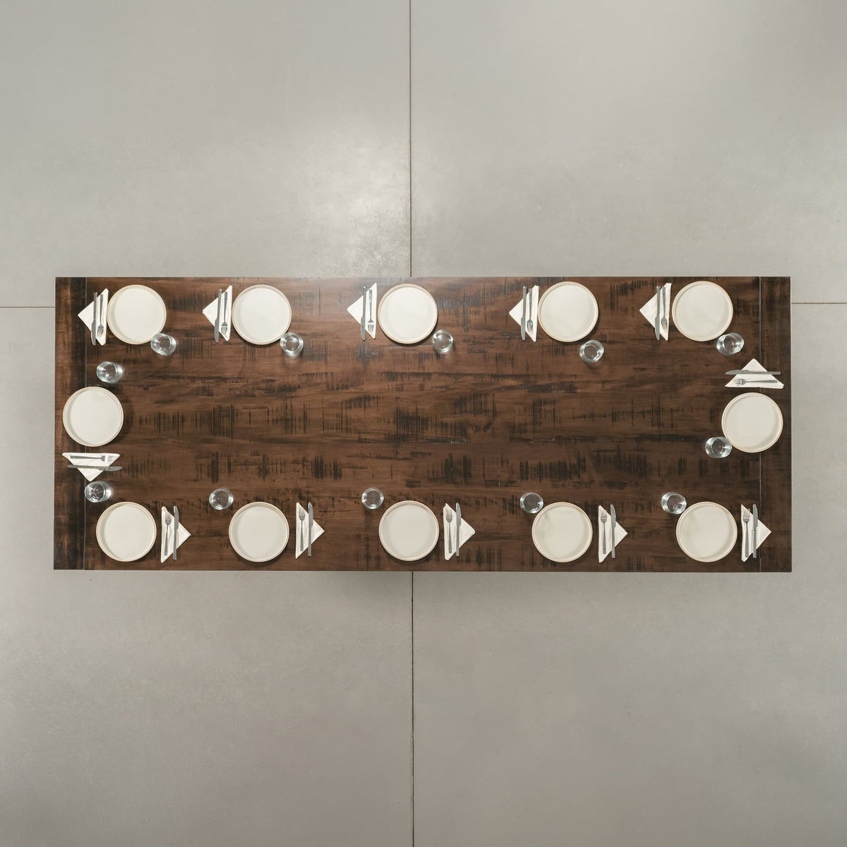 seating for 12 at a Rustic Maple table 48” wide x 120” long, finished in Mocha on Echo base
