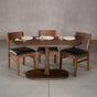 oval Walnut table 29” wide x 55” long, finished in Cortado D on a Jennings pedestal base, shown with Aubrey chairs