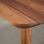 the Finlay edge on an extendable Walnut table finished in Pure D on Milford base