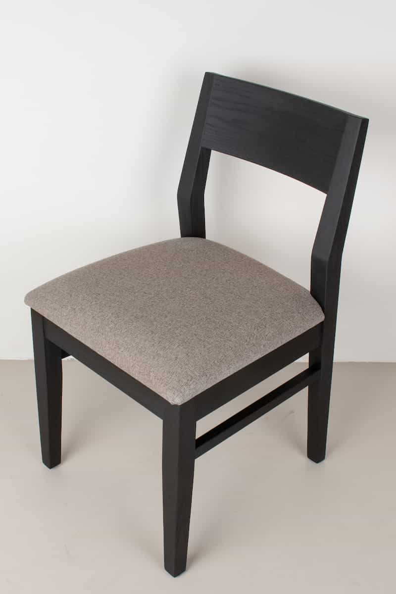clay fabric seat on black oak chair