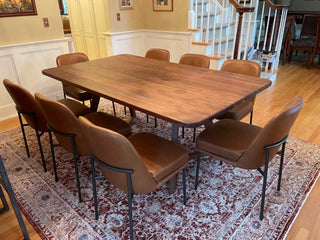walnut table with softened edges on walnut legs