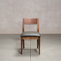 an Aubrey side chair in Walnut with a Thunder Leather seat