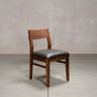 an Aubrey side chair in Walnut with a Thunder Leather seat