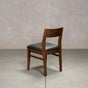 an Aubrey side chair in Walnut with a Thunder Leather seat