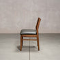 an Aubrey side chair in Walnut with a Thunder Leather seat