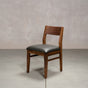 an Aubrey side chair in Walnut with a Thunder Leather seat