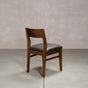 an Aubrey side chair in Walnut with a Thunder Leather seat