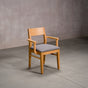 a White Oak Aubrey Armchair finished in Pure D with Graphite fabric seat