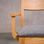 arm detail on a White Oak Aubrey Armchair finished in Pure D with Graphite fabric seat