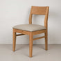 Oak chair finished in Pure D with a Fog faux leather seat
