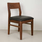 Walnut chair finished in Pure D with a Pepper faux leather seat