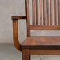 arm detail on a high back dining chair in Walnut