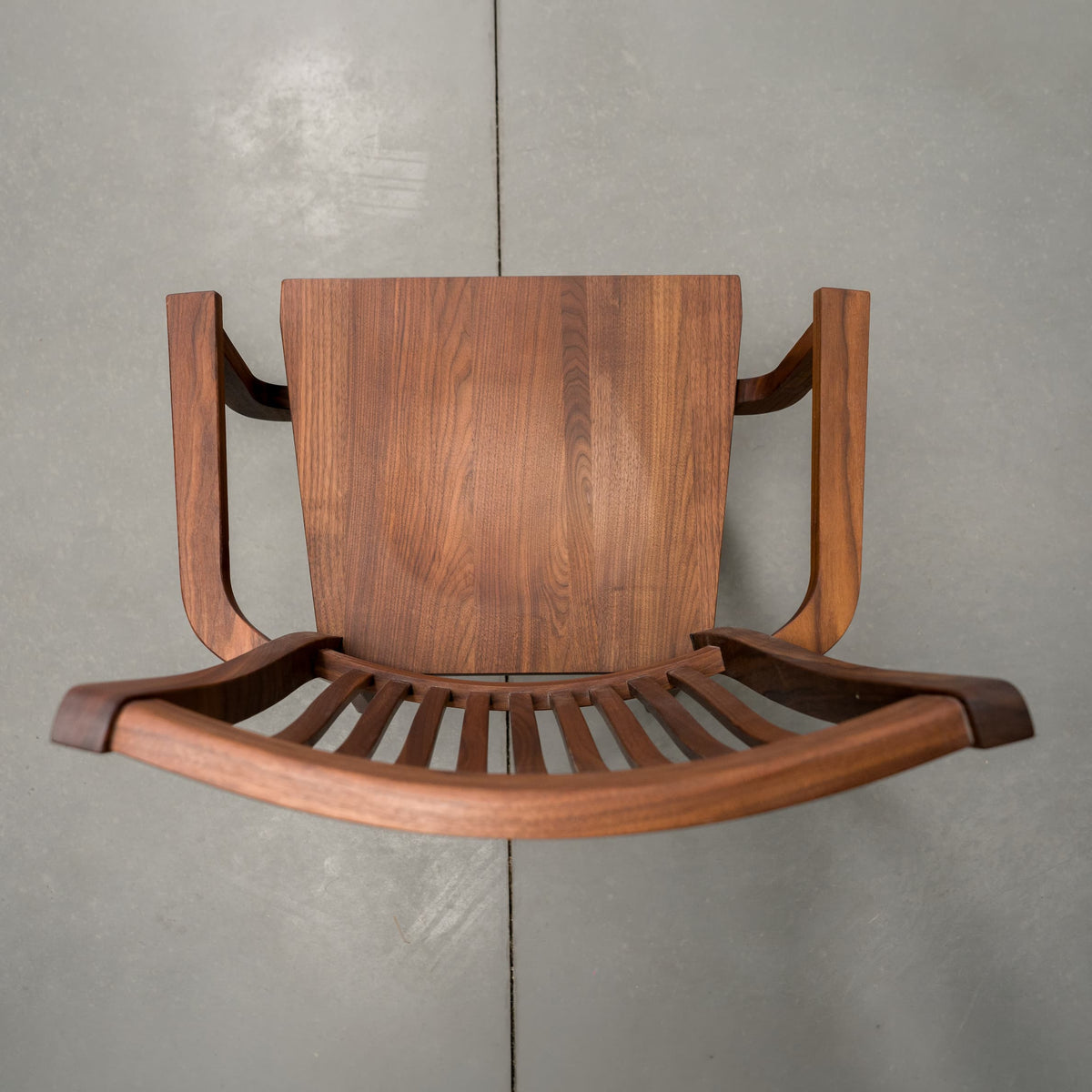 overhead view of a high back dining chair with arms in Walnut