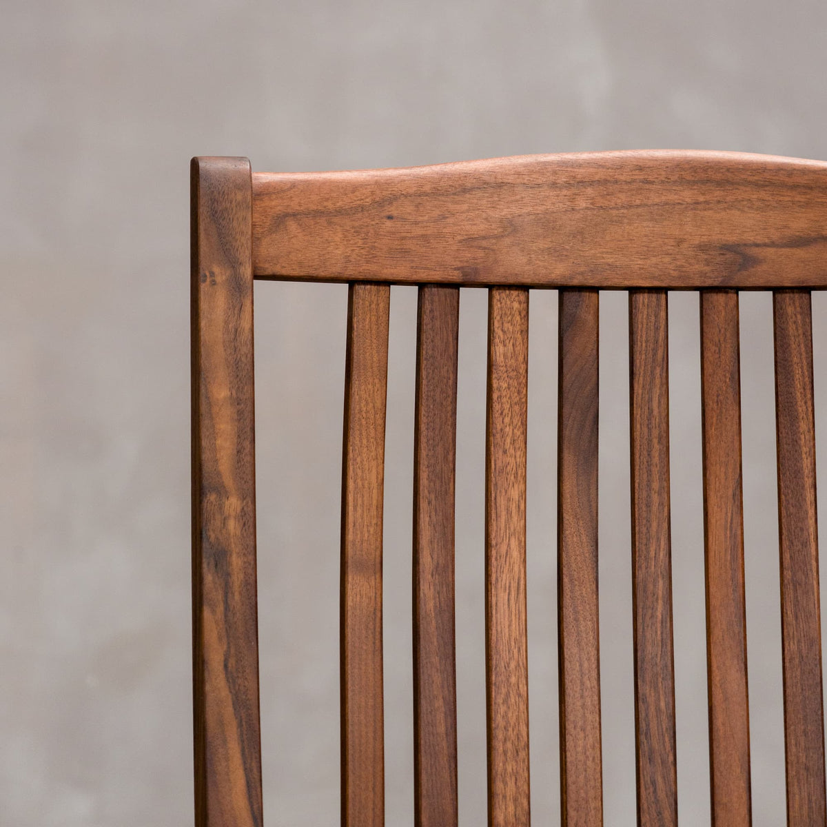 chair back detail on a high back dining chair in Walnut