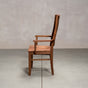 a high back dining chair with arms in Walnut
