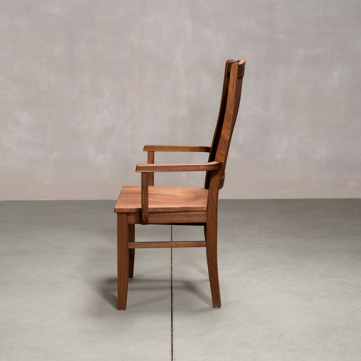 a high back dining chair with arms in Walnut