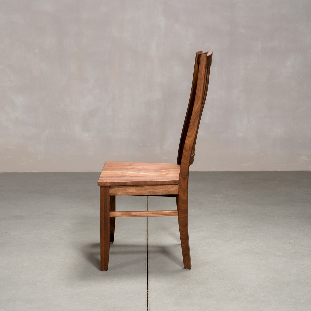 high back Betzner dining chair in Walnut