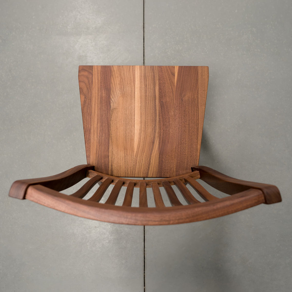 overhead view of a high back Betzner dining chair in Walnut