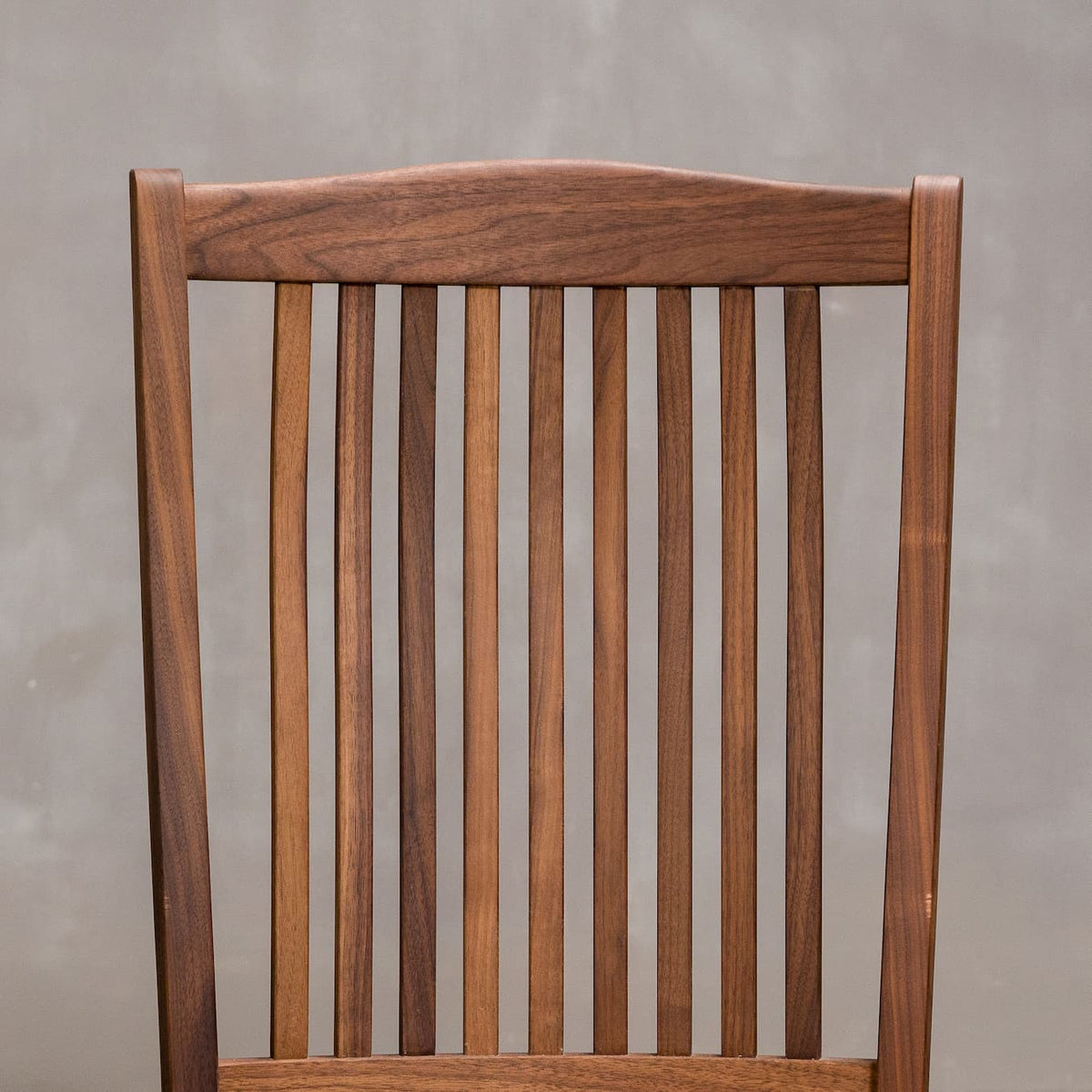 back detail on a Betzner dining chair in Walnut