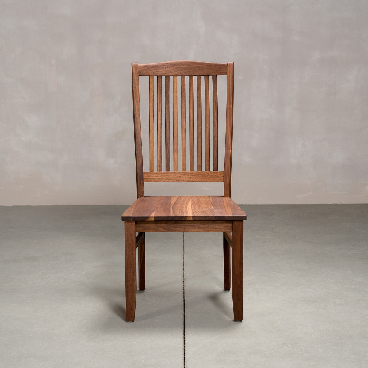 high back Betzner dining chair in Walnut