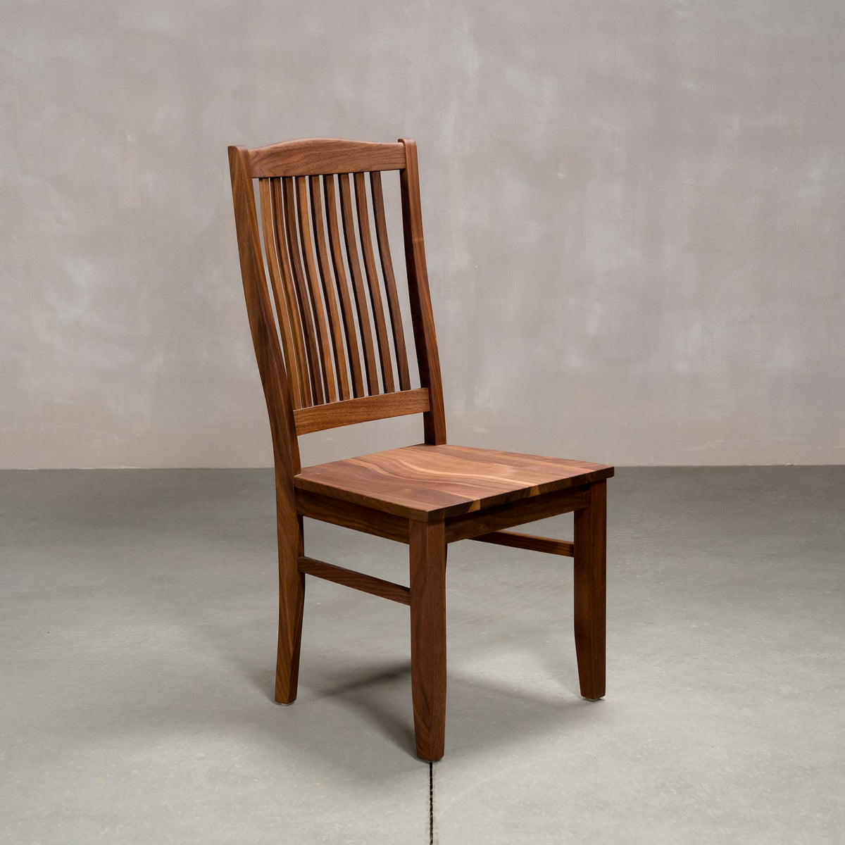 high back Betzner dining chair in Walnut