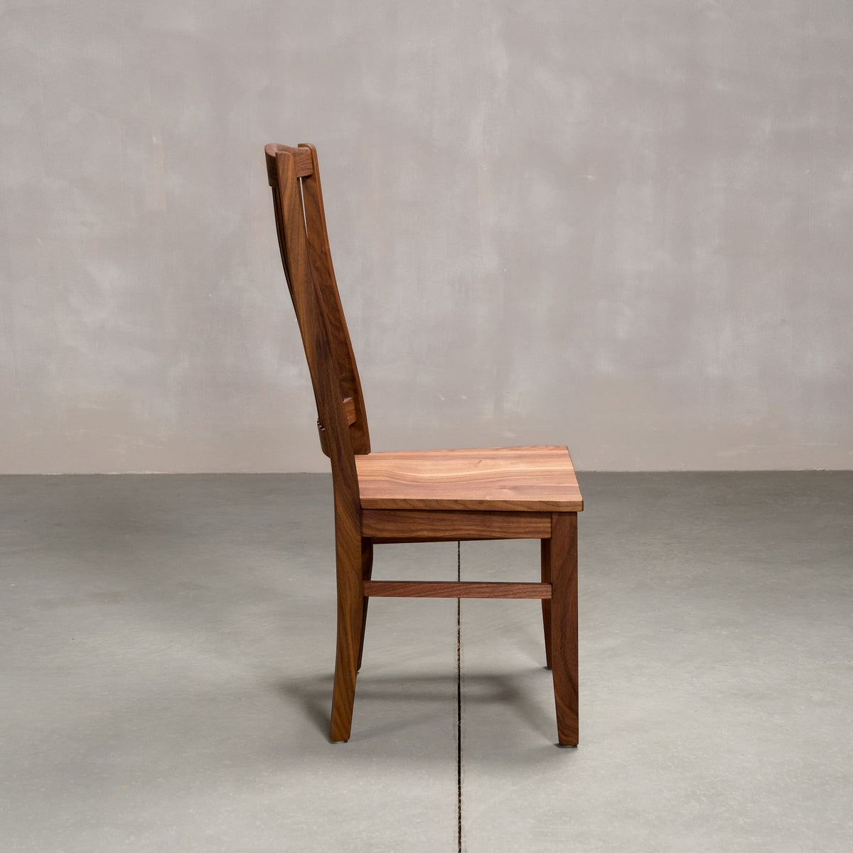 high back Betzner dining chair in Walnut