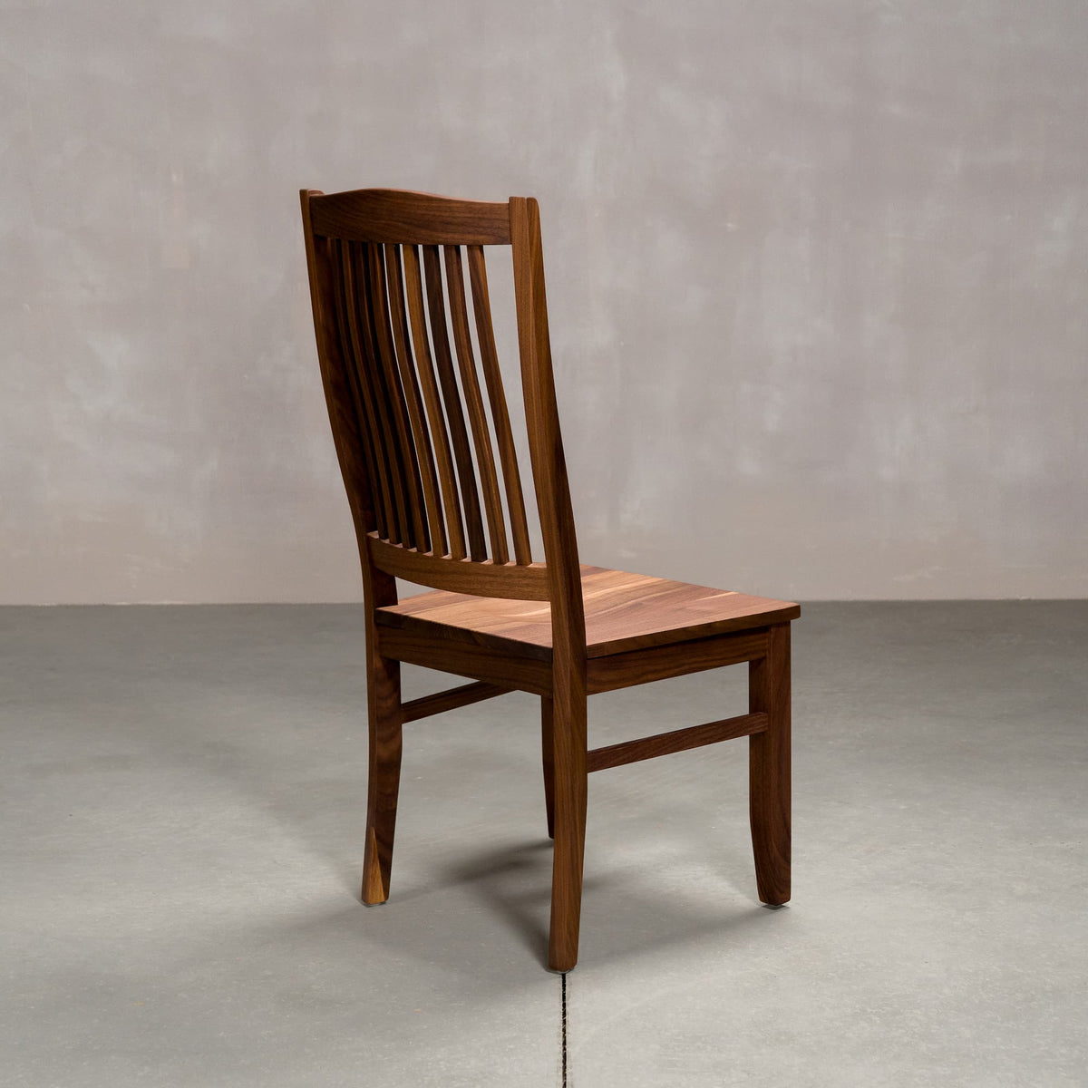 high back Betzner dining chair in Walnut