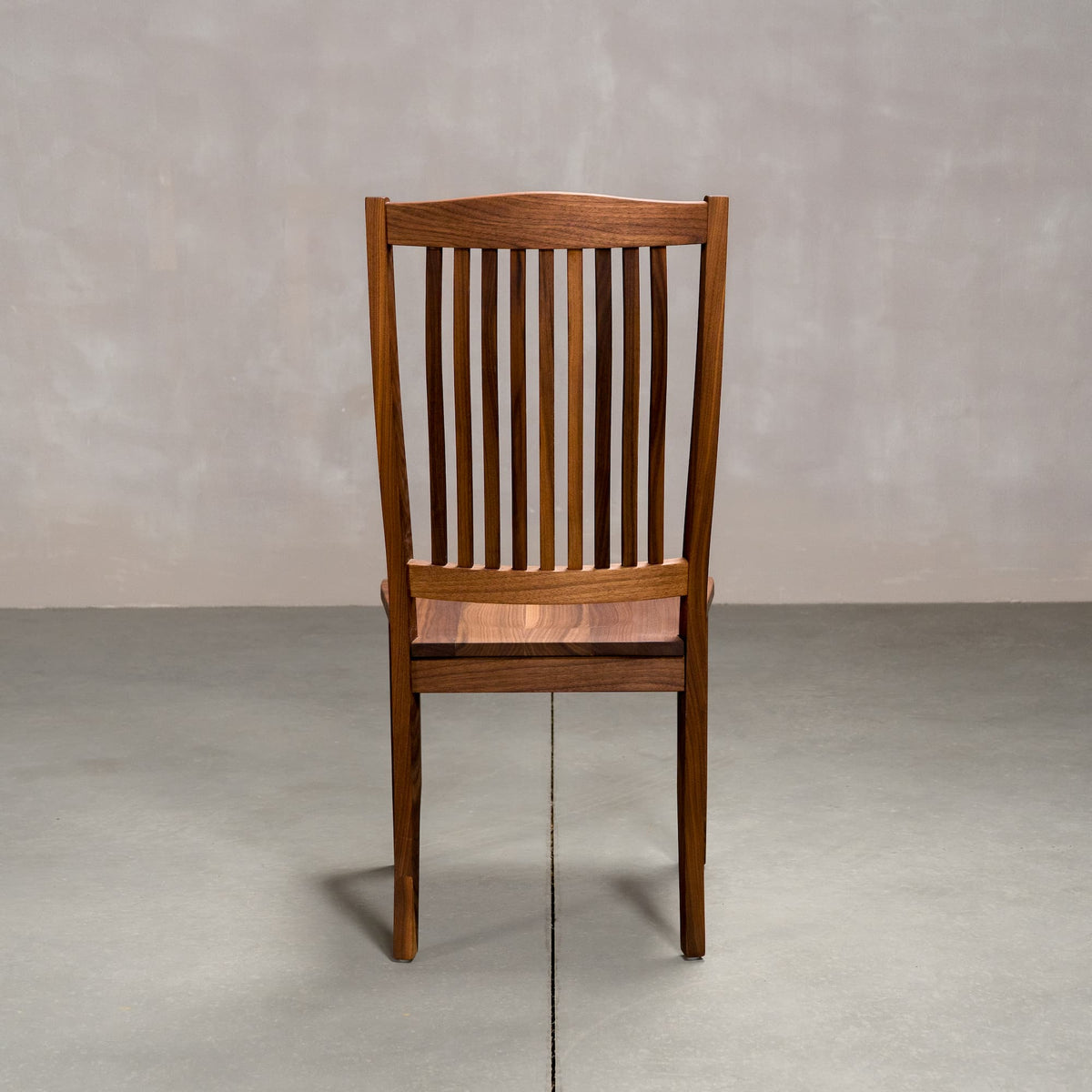 high back Betzner dining chair in Walnut