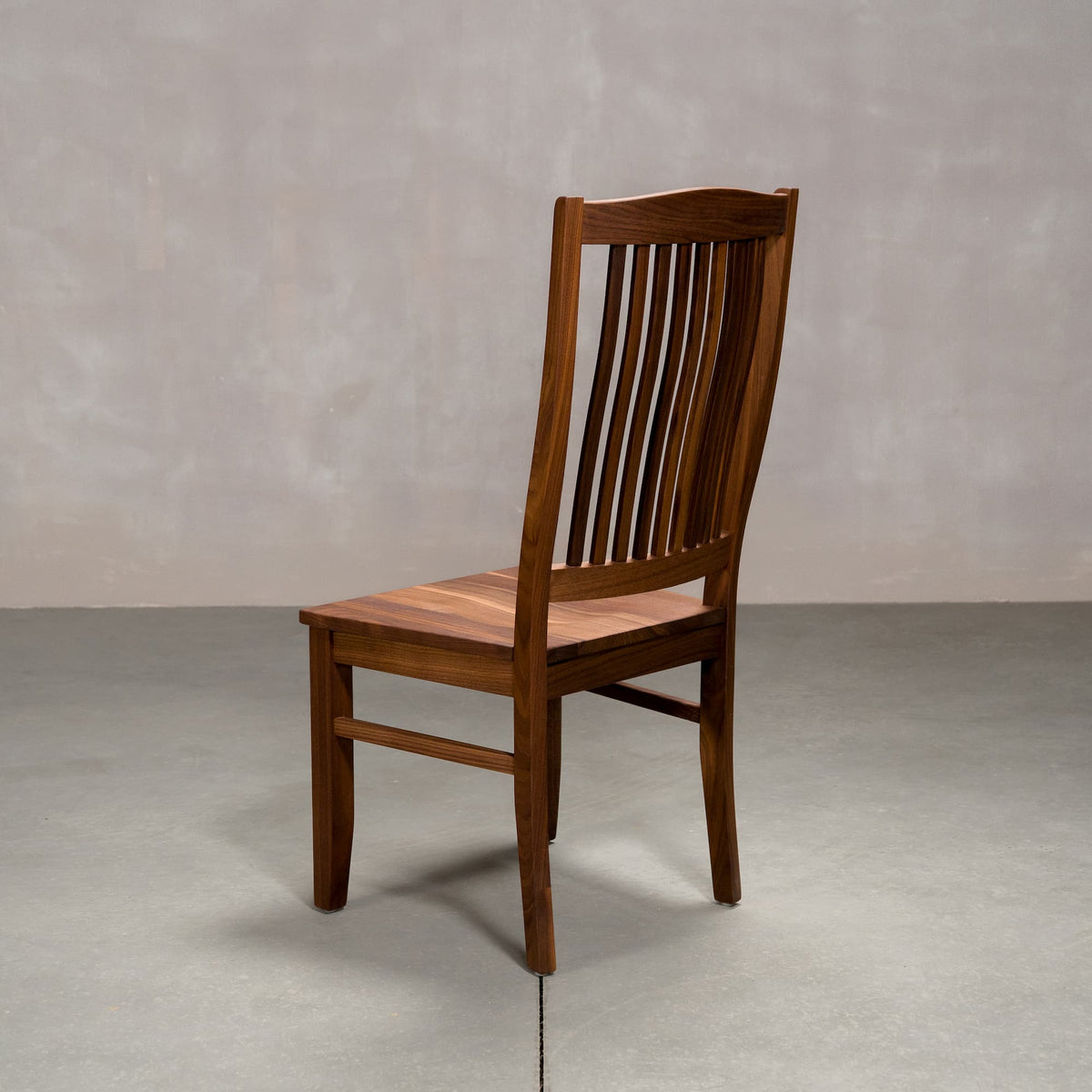 high back Betzner dining chair in Walnut