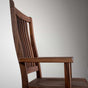 high back walnut dining chair with arms finished in Pure D