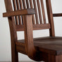 high back walnut dining chair with arms finished in Pure D