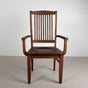high back walnut dining chair with arms finished in Pure D