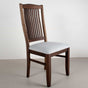 high back Walnut chair with a white cushion