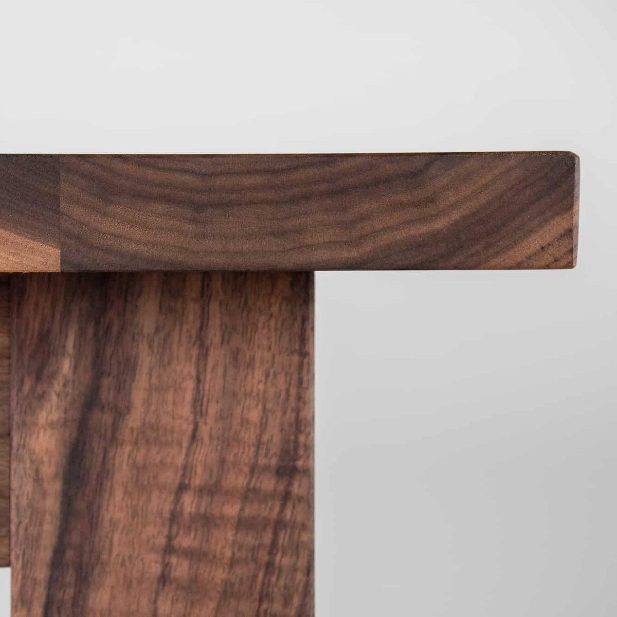 corner detail of a Walnut table 36