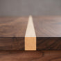 center line detail of a custom walnut ping pong table 
