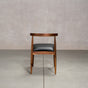 midcentury modern Walnut dining chair with an Onyx Faux Leather seat