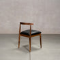 midcentury modern Walnut dining chair with an Onyx Faux Leather seat