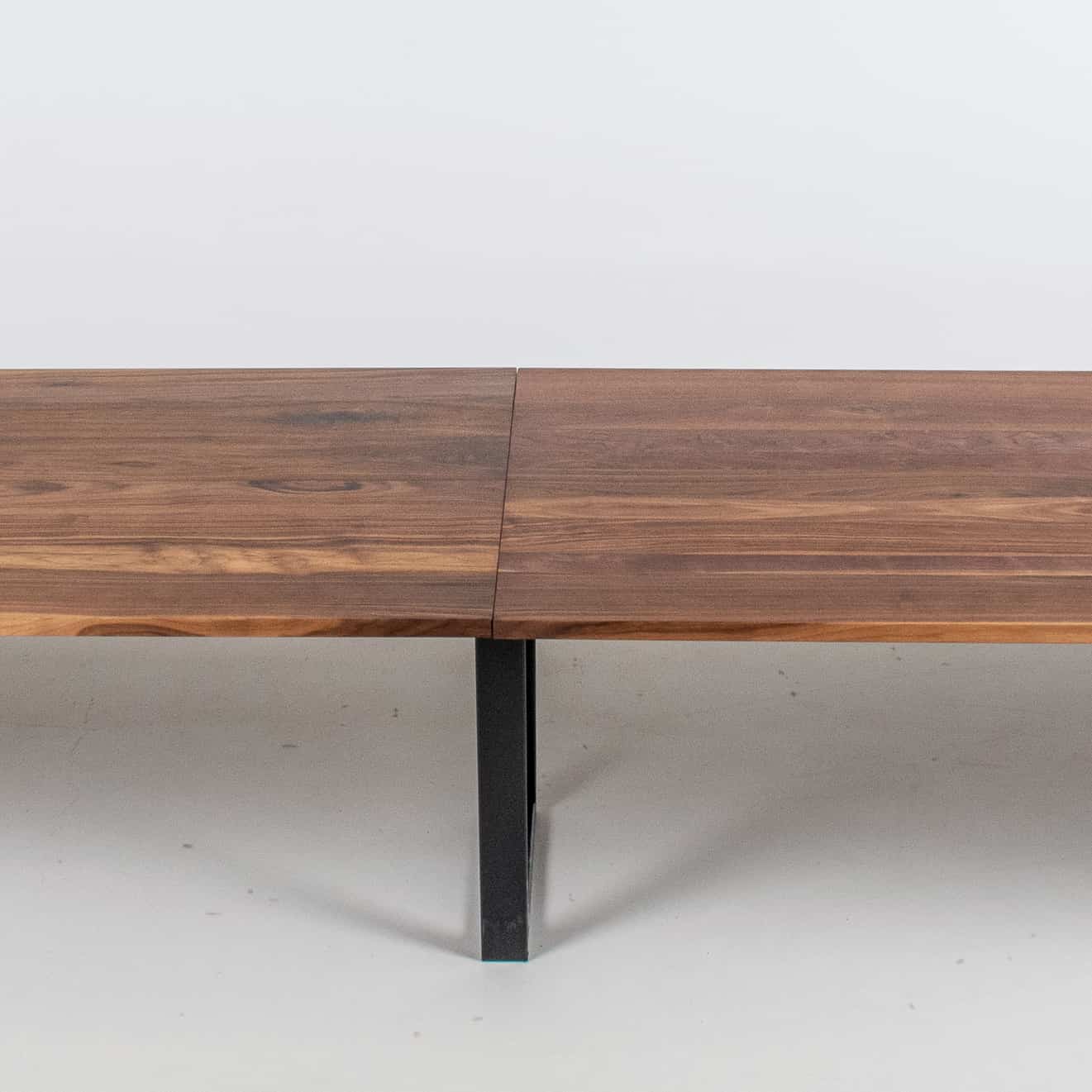 long walnut table with center support leg