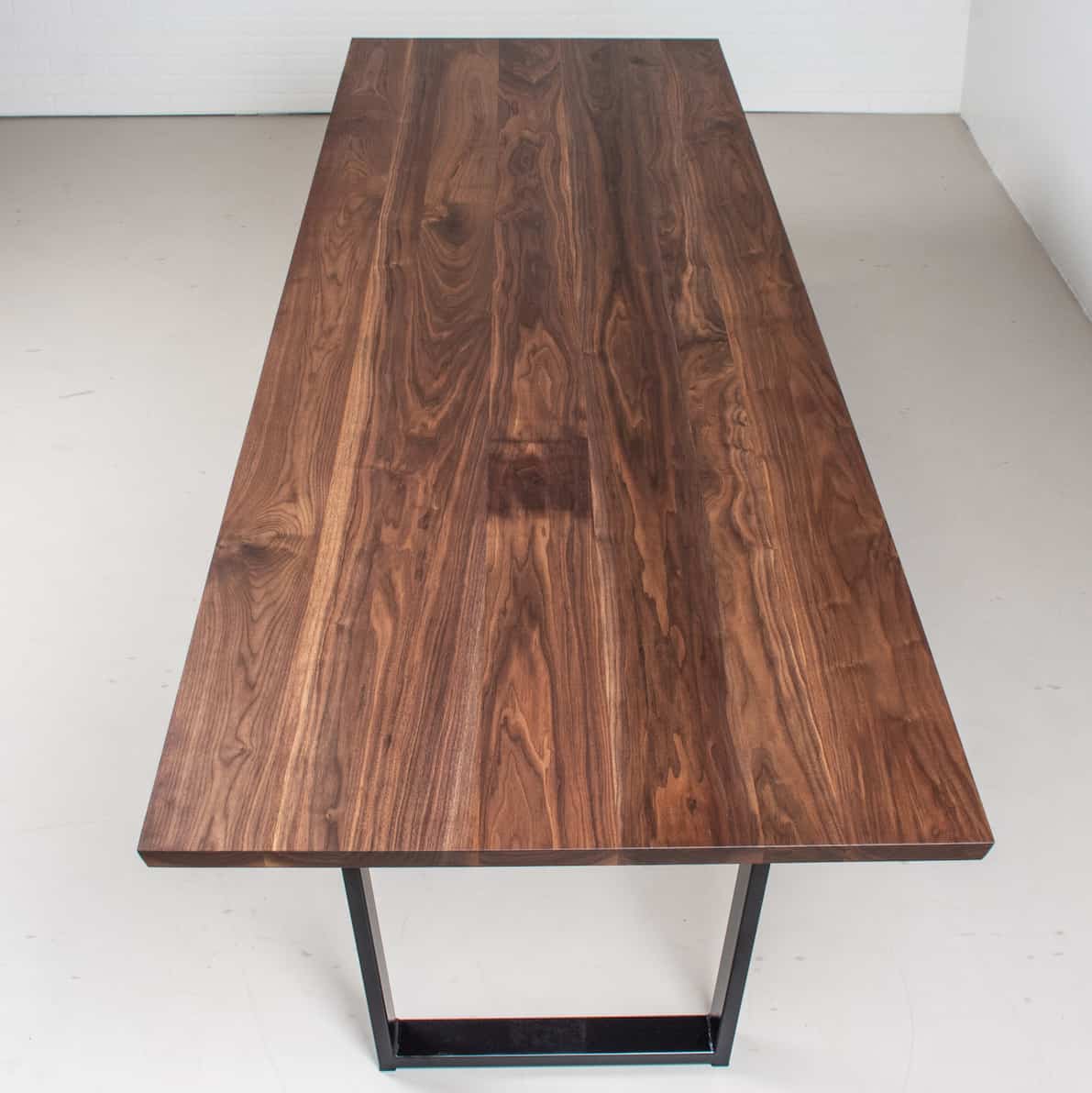 walnut conference table on steel legs