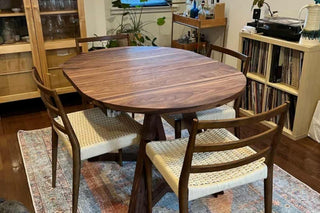walnut racetrack oval extension table on walnut legs