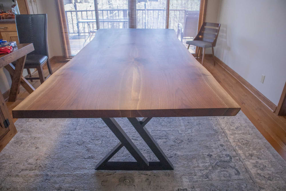 bookmatch walnut table on black zionz legss