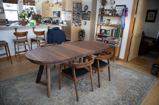 walnut racetrack oval extension table on caldwell legs