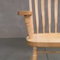arm detail of a hoop back dining chair with arms made of Maple with a Pure D finish