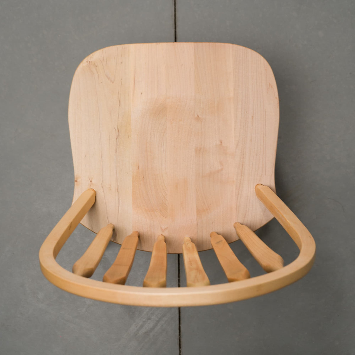 overhead view of a hoop back dining chair made of Maple with a Pure D finish