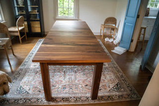 walnut center extension table on parsons base