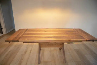 walnut end extension table on upside down Y trestle base