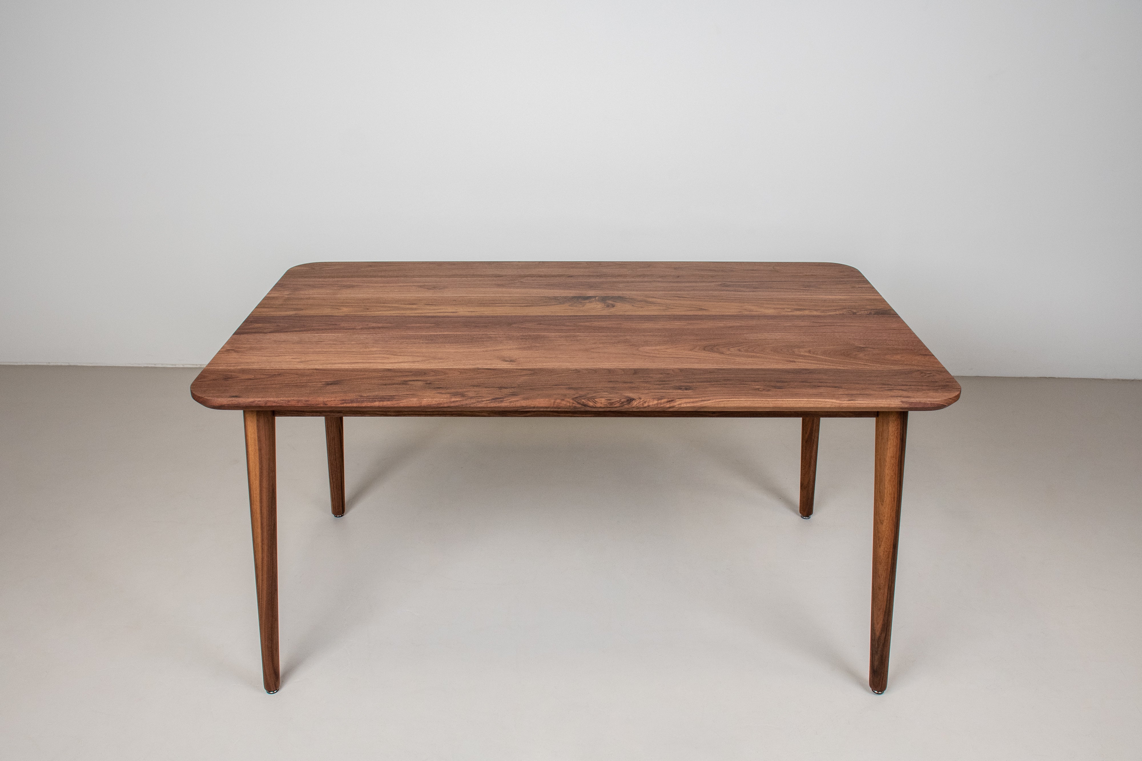 Custom Walnut dining pieces for Andreana and Wook