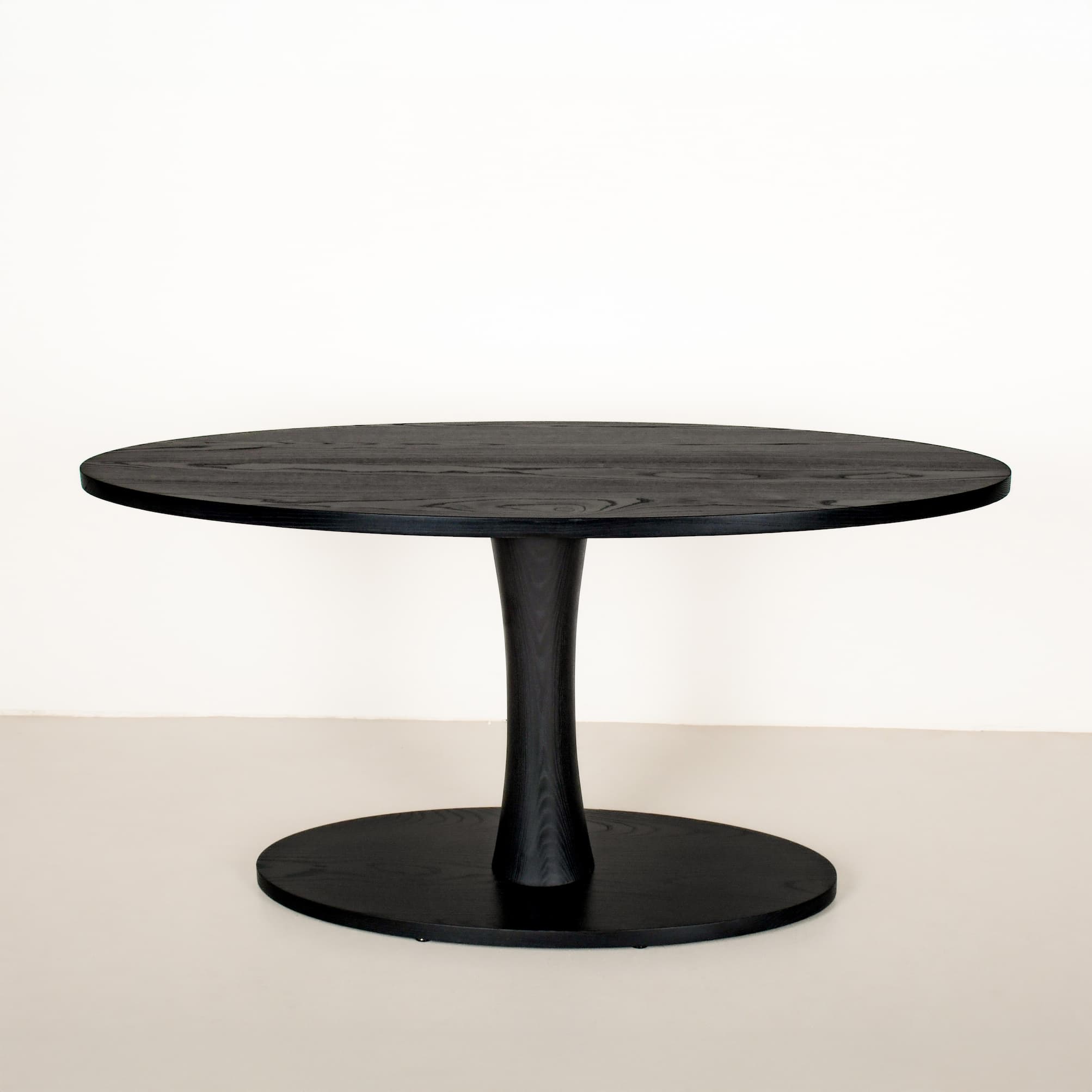 elliptical oval pedestal table finished in black