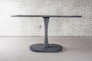 ash wood oval table on pedestal base finished in iron gray