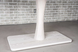 white ash rectangle table on pedestal base